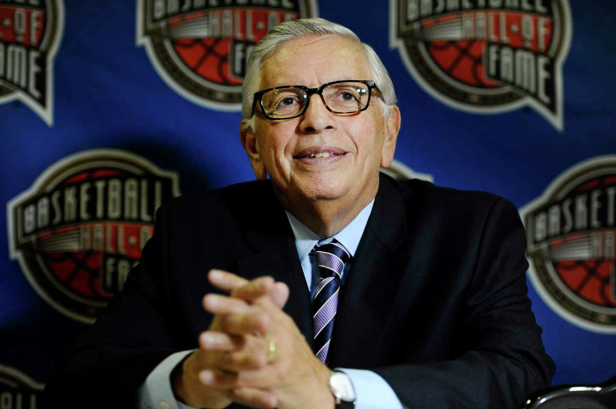 FILE - In this Aug. 7, 2014, file photo, David Stern, a member of the 2014 class of inductees into the Basketball Hall of Fame, listens to a question during a news conference in Springfield, Mass. A tribute to late NBA Commissioner Stern is to be held at New York's Radio City on Tuesday, Jan. 21, 2020. (AP Photo/Jessica Hill, File)