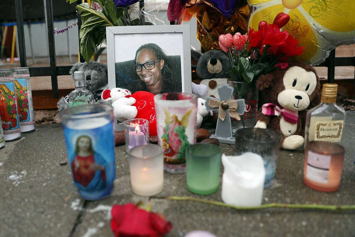 A memorial at the scene of the death by hit and run driver of Miesha Singleton in front of Elmhurst United Middle School in Oakland, Calif., on Tuesday, January 21, 2020.