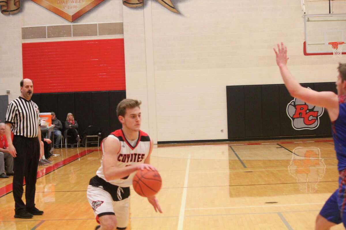 Reed City's Logan Hansen gets set to drive against Chippewa Hills on Jan. 14. (Herald Review/John Raffel)