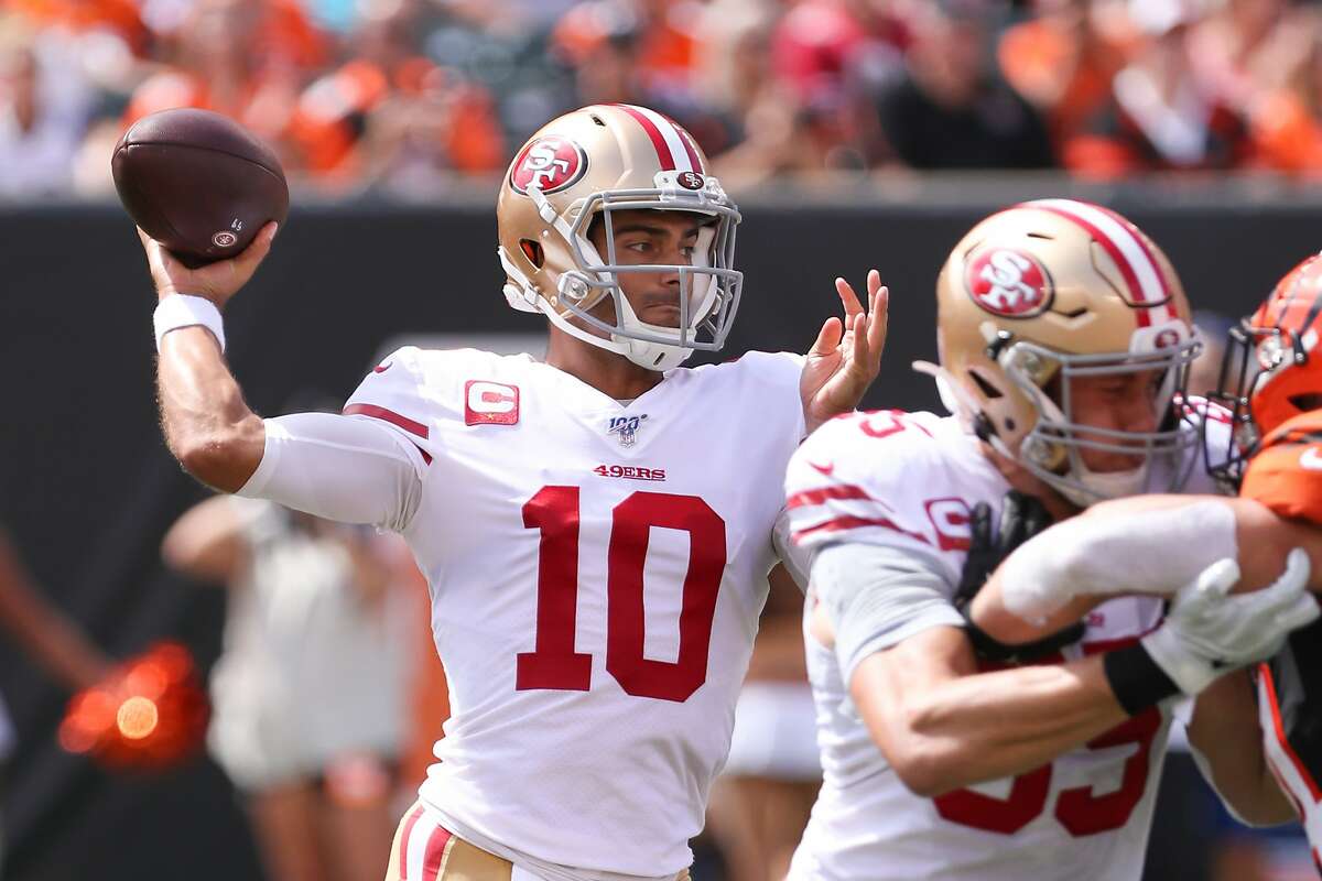 San Francisco 49ers defensive end Nick Bosa (97) and teammate Dee Ford (55)  combine to sack Minnesota Vikings quarterback Kirk Cousins (8) during an  NFL divisional playoff game, Saturday, Jan. 11, 2020