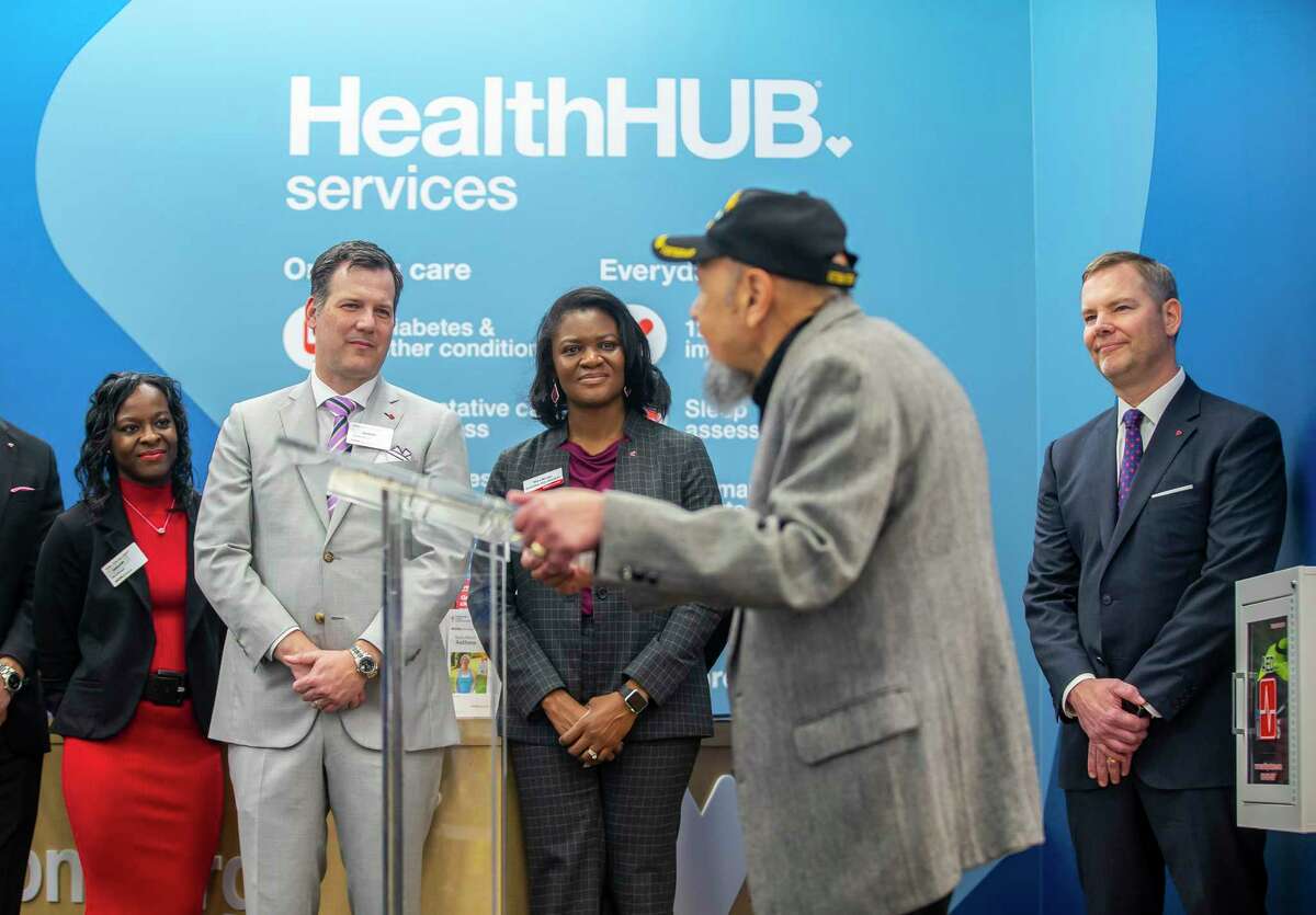 Gene Anthony Phillips, of Tomball, speaks during a ceremony to celebrating the expansion of CVS's Minute Clinic concept into even more expanded "health hubs" in 15-Houston area store in the Galleria area on Monday, Jan. 13, 2020. Phillips, a Vietnam veteran, started using the health hub at his local CVS in Tomball in 2018, and because he had such a positive experience, was invited to speak at the ceremony. Phillips has taken advantage of many of the expanded services and credits his local care concierge, Jesse Gonzalez, with helping him stop needing a cane to walk.