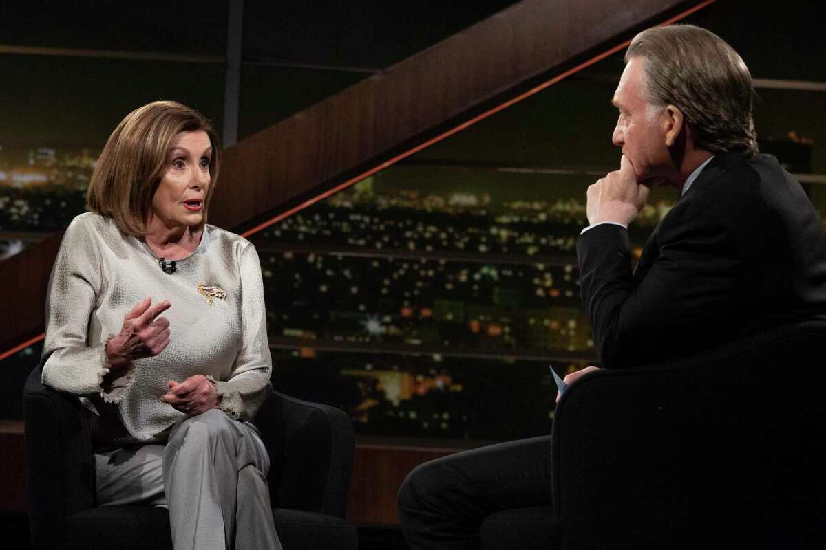 Bill Maher, right, listens to House Speaker Nancy Pelosi, a recent guest on his show. One reader says Pelosi won’t be remembered by future generations for ushering in impeachment, and may be helping Trump.