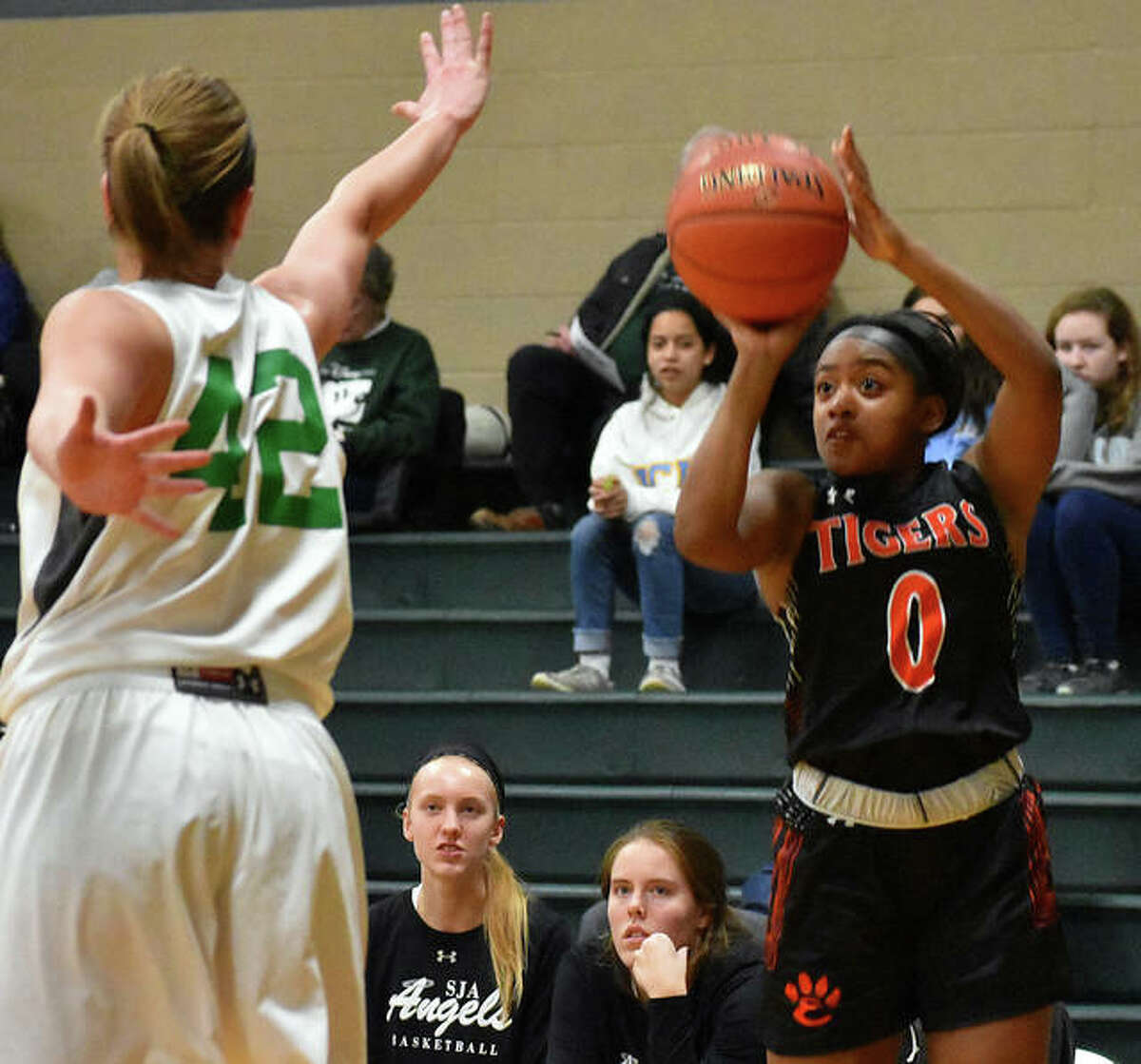 Edwardsville senior guard Quierra Love puts up a 3-pointer in the second quarter against St. Joseph’s on Wednesday in St. Louis.