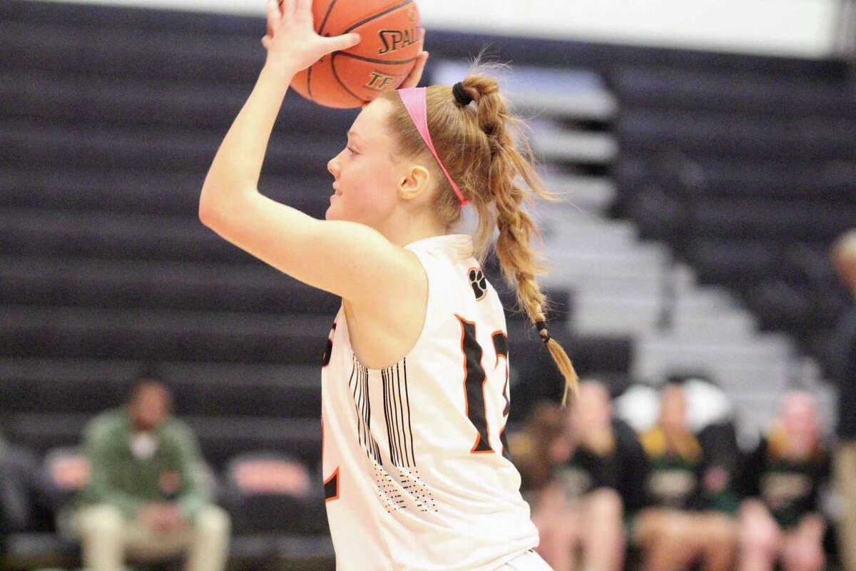 Sophomore Siovhan Moroney contributed 10 points and five rebounds in Ridgefield's win over Trinity Catholic.