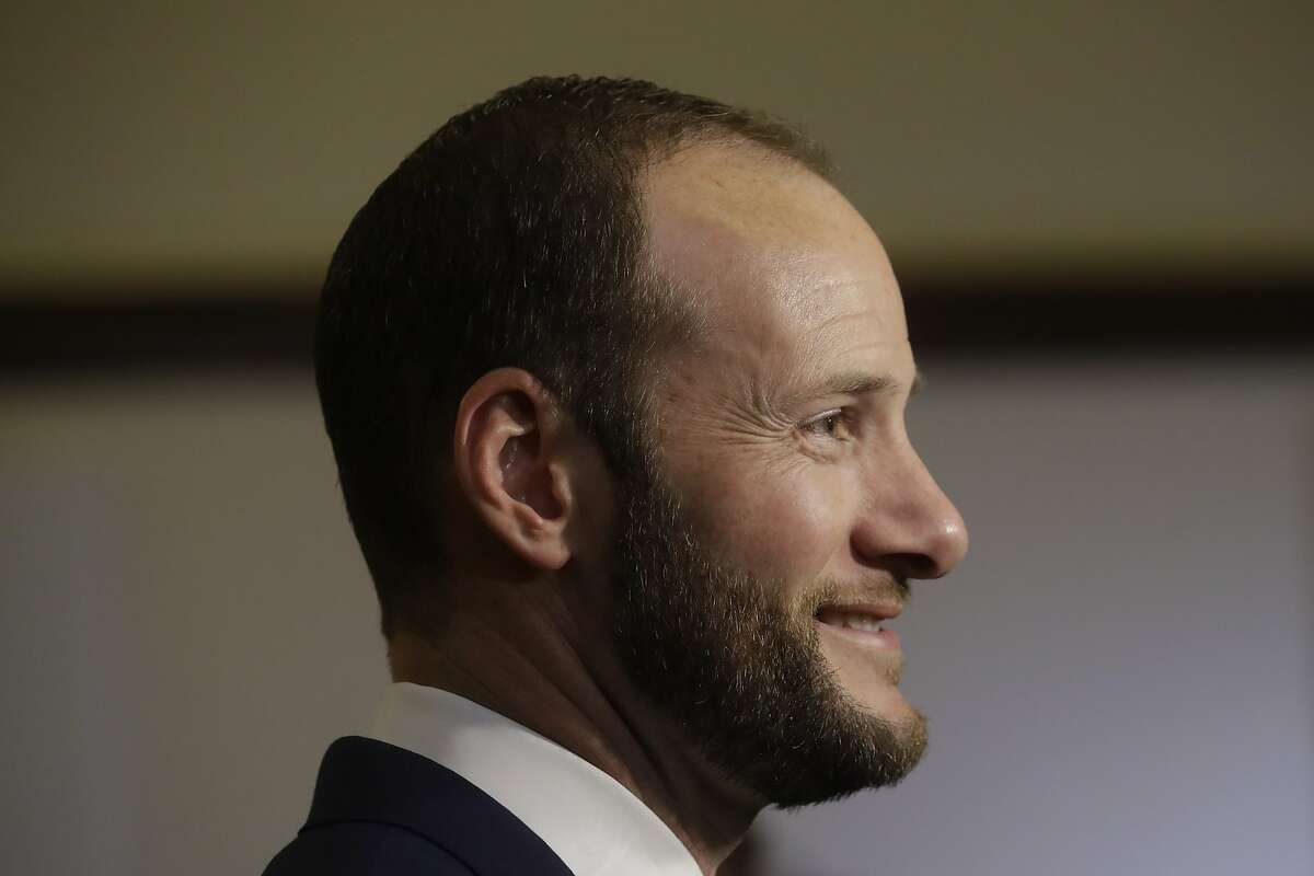 San Francisco District Attorney Chesa Boudin speaks to reporters before his swearing in ceremony in San Francisco, Wednesday, Jan. 8, 2020. (AP Photo/Jeff Chiu)