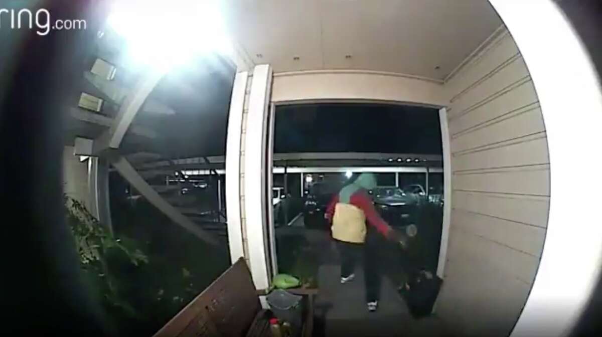 A Ring doorbell camera shows a violent robbery in the Oakland hills Monday night.