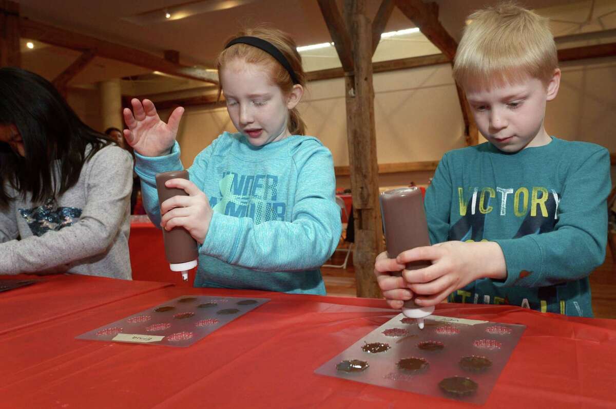 Children may create hand-made molded chocolates and decorated boxes to put them in during the one-hour Valentine's Day chocolate-making workshop on Feb. 8 at the Wilton Historical Society.