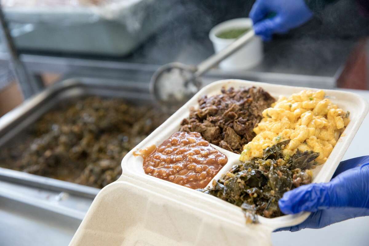 The Vegan Mob Plate from with smoked plant-based brisket, smackaroni and cheese, BBQ baked beans, and collard greens. The Oakland-based Vegan Mob is going on the road and has opened its first food truck.