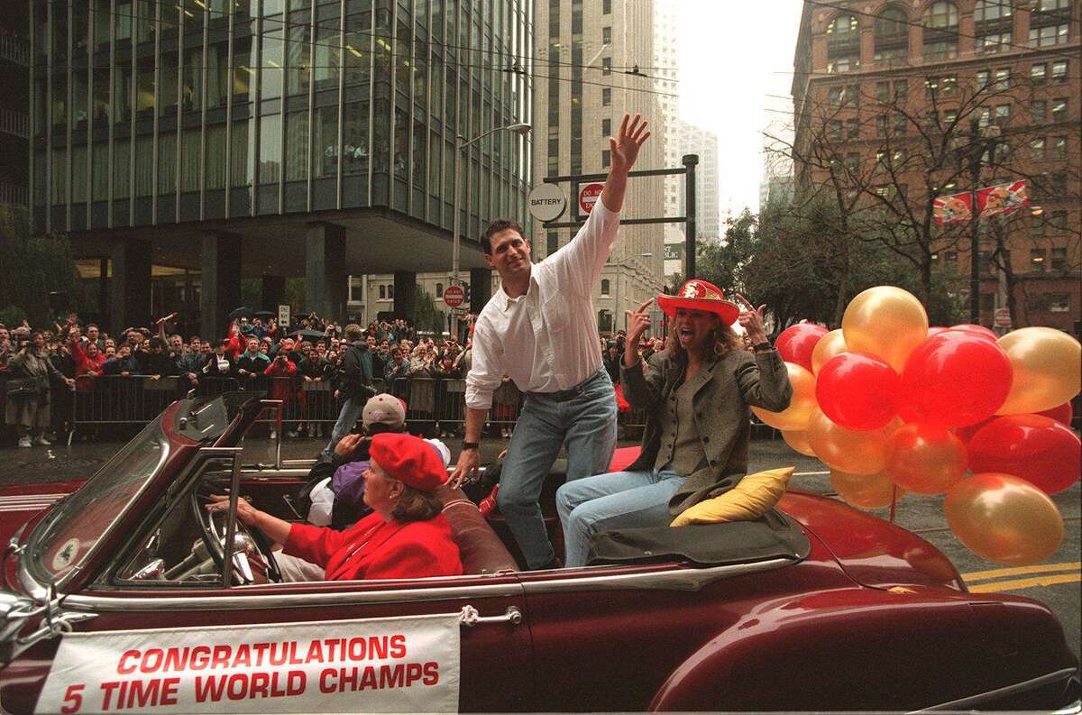San Francisco 49ers Quarterback Steve Young waves to 49ers fans during the Super Bowl XXIX parade in San Francisco, Calif. on January 30, 1995.