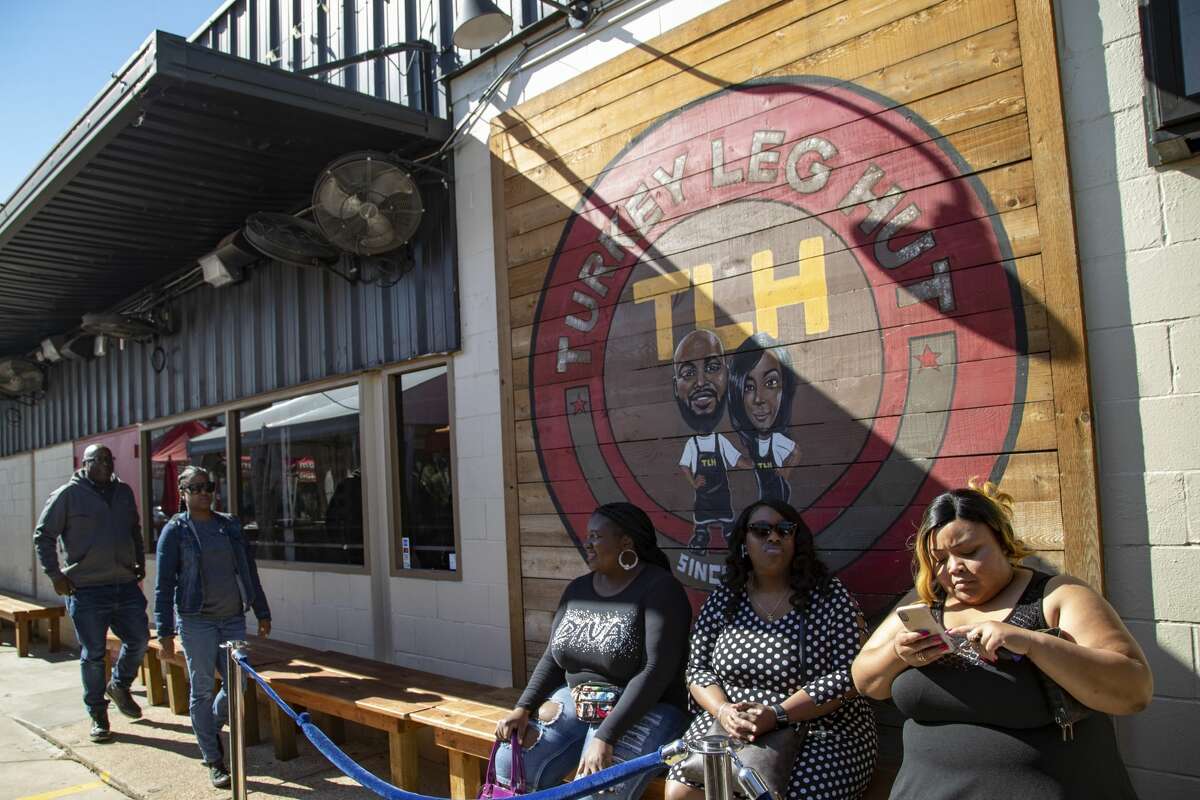 Customers waiting in line for a table at Turkey Leg Hut, a restaurant located in the Third Ward on Friday, Dec. 6, 2019, in Houston.