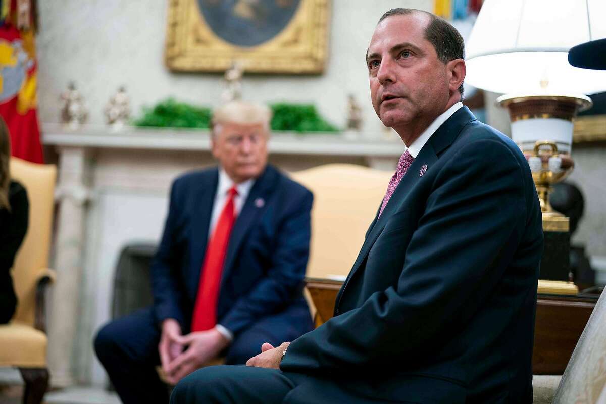 FILE -- Alex Azar, the health and human services secretary, with President Donald Trump at the White House in Washington, Sept. 11, 2019. During an Oval Office meeting on Thursday, Jan. 16, 2019, Trump called Azar and upbraided him over the administration’s ban on most flavored e-cigarettes, a proposal that Trump had vacillated over for months but ultimately endorsed, according to three people familiar with what took place. (Doug Mills/The New York Times)