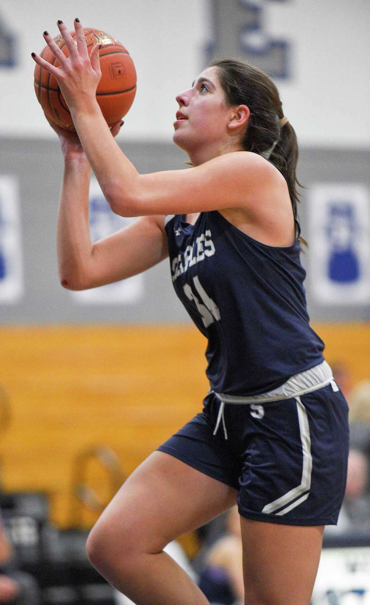 Staples girls basketball team pulls away from Greenwich, behind Gerig