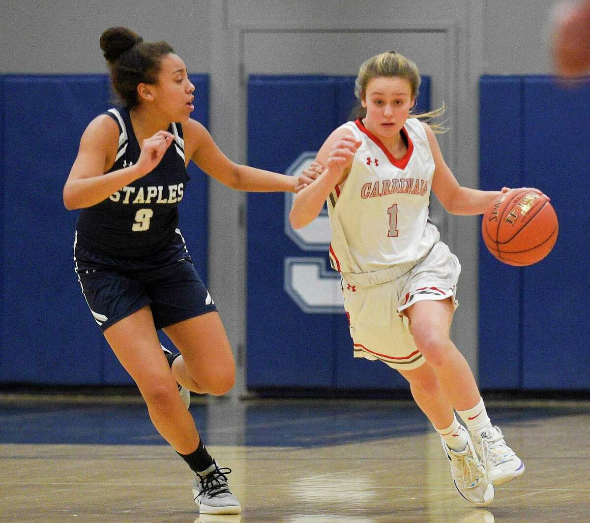 Staples girls basketball team pulls away from Greenwich, behind Gerig