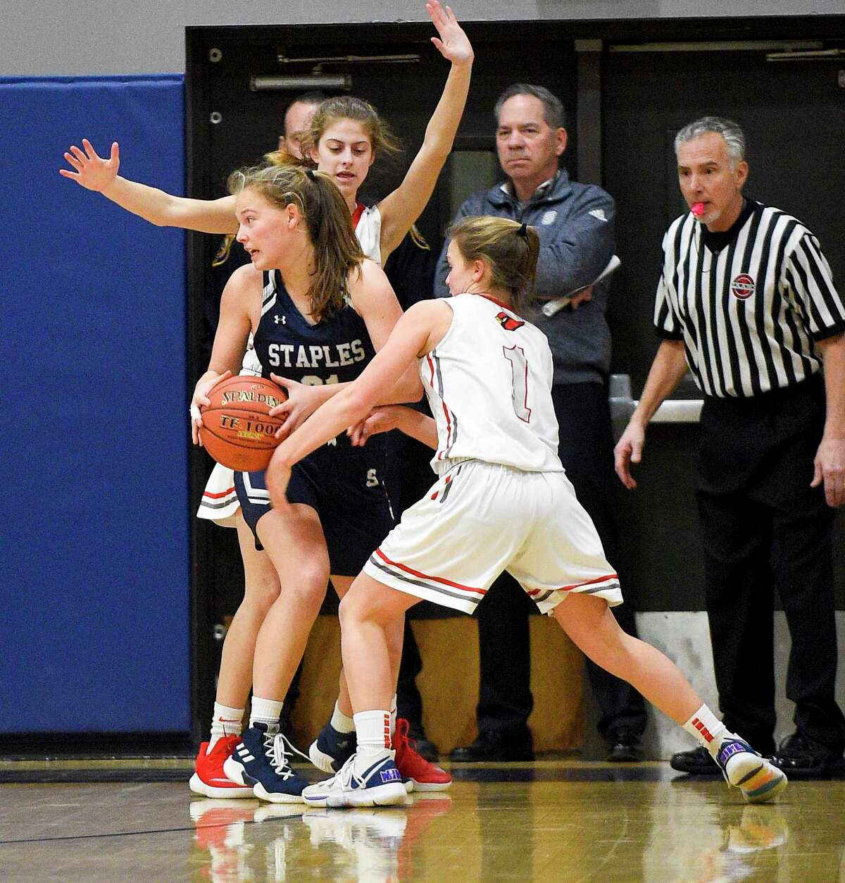 Staples girls basketball team pulls away from Greenwich, behind Gerig