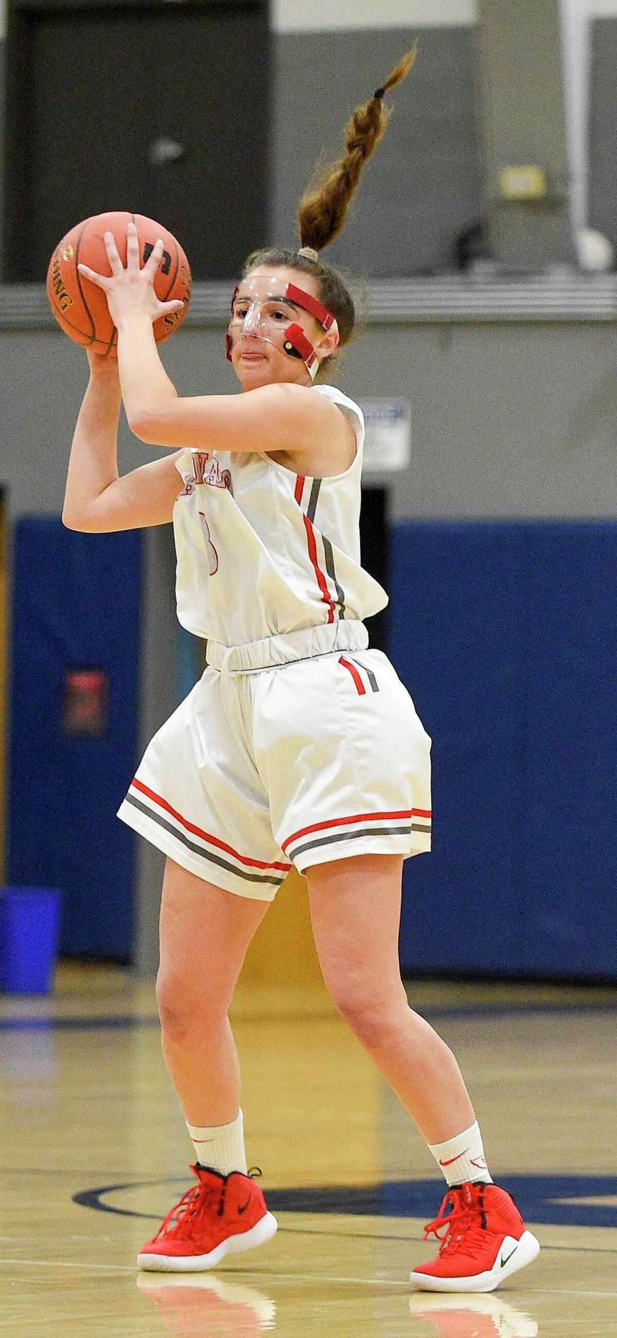 Staples girls basketball team pulls away from Greenwich, behind Gerig