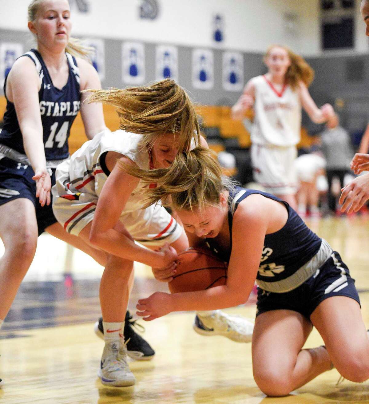 Staples girls basketball team pulls away from Greenwich, behind Gerig