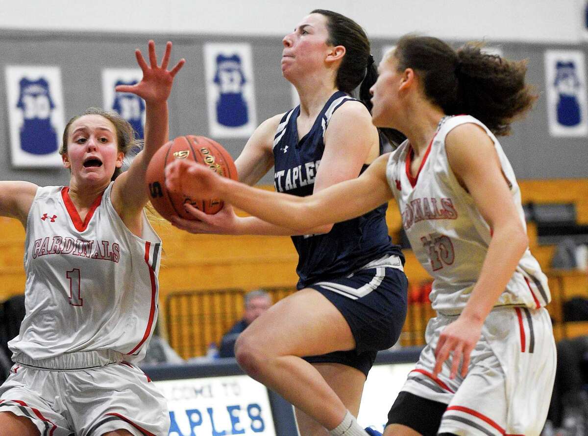 Staples girls basketball team pulls away from Greenwich, behind Gerig