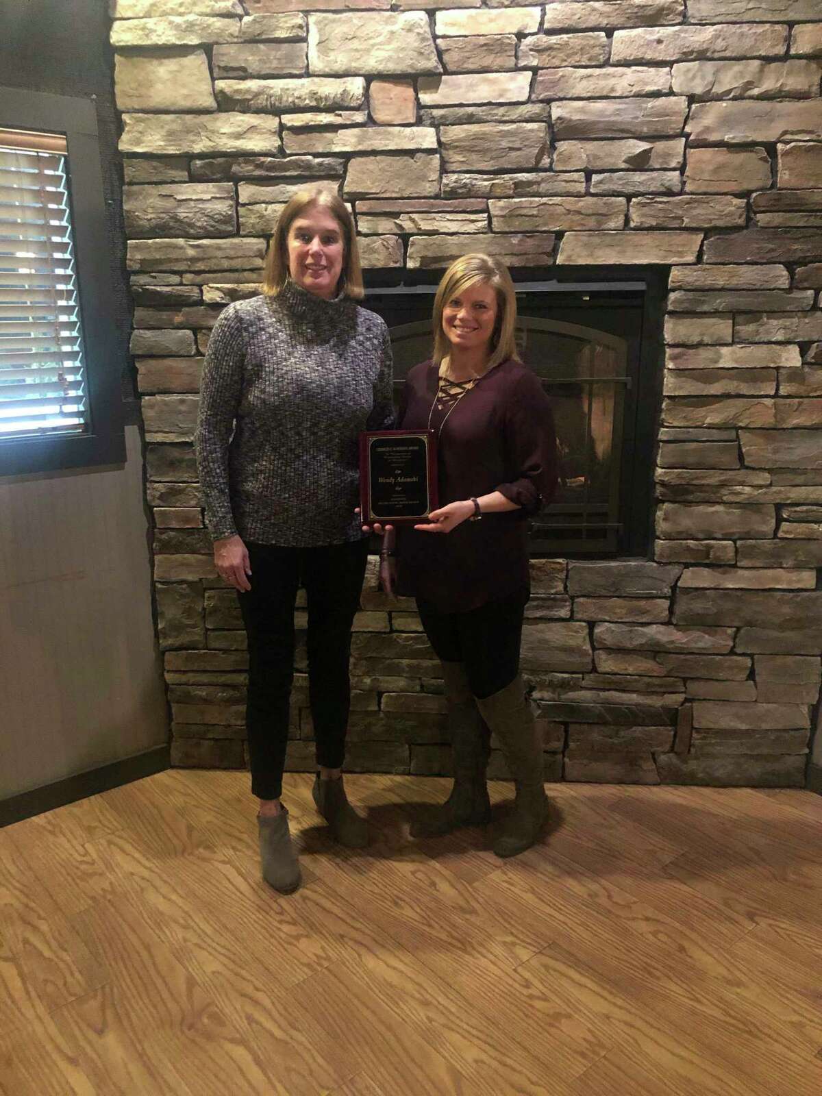 Wendy Adamski (left) has participated with the Manistee Recreation Association for many years with a variety of different programs, including coaching and volunteering.  She was recently named the individual winner of this year's Charles E. Schoedel award from the MRA. Adamski is pictured with MRA executive director Stephanie Carpenter.  (Courtesy photo)
