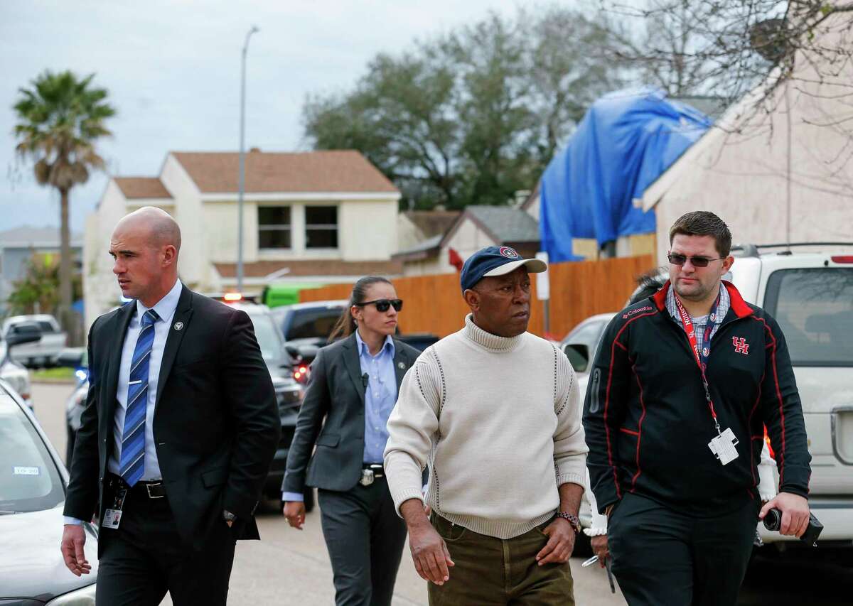 Mayor Sylvester Turner visits Stanford Court, where many homes were heavily damaged during the explosion at Watson Grinding and Manufacturing, on Saturday, Jan. 25, 2020, in Houston.