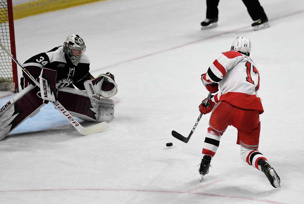 Rensselaer Polytechnic Institute forward Todd Burgess (17) scores against Union goaltender Darion Hanson (34) winning a 2-1 shoot-out during the men's Mayor's Cup college hockey game Saturday, Jan. 25, 2020, in Albany, N.Y. (Hans Pennink / Special to the Times Union) ORG XMIT: 012620_Men_HP129