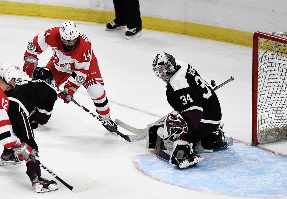 Rensselaer Polytechnic Institute forward Zach Dubinsky (14) scores against Union goaltender Darion Hanson (34) during the second period of the men's Mayor's Cup college hockey game Saturday, Jan. 25, 2020, in Albany, N.Y. (Hans Pennink / Special to the Times Union) ORG XMIT: 012620_Men_HP132