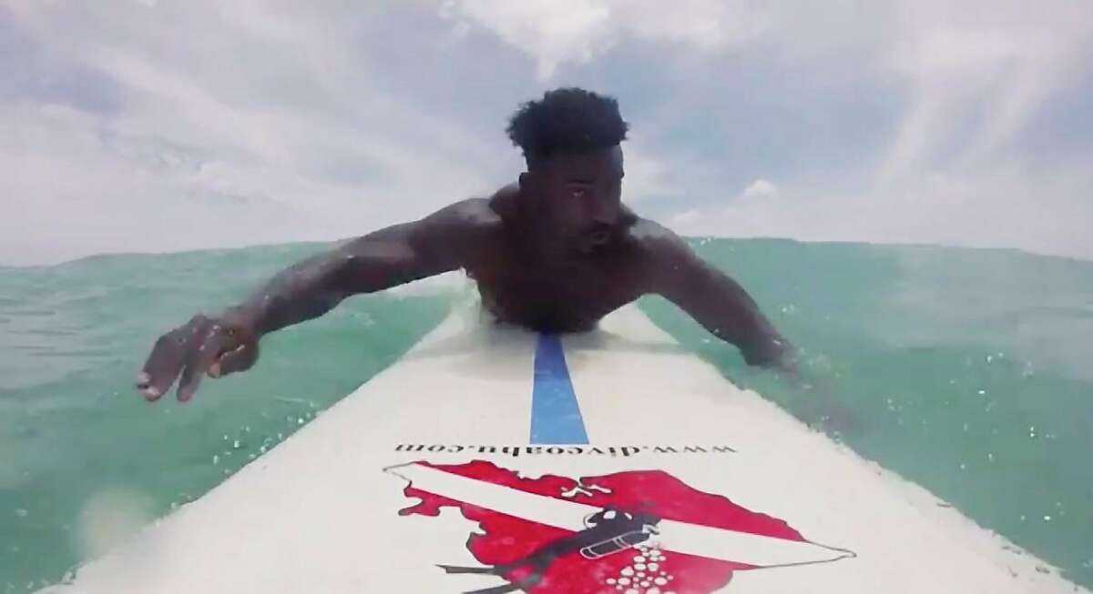 San Francisco 49ers Running back Raheem Mostert captured himself surfing using a GoPro in Waikiki, Hawaii in July 2018. Mostert's touchdown celebration involves paddling and surfing.