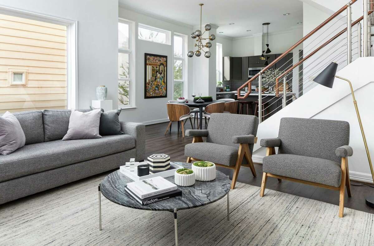Designer Lacey Michalek combined shades of gray in the Midtown home of Paul and Alice Schrynemeeckers.