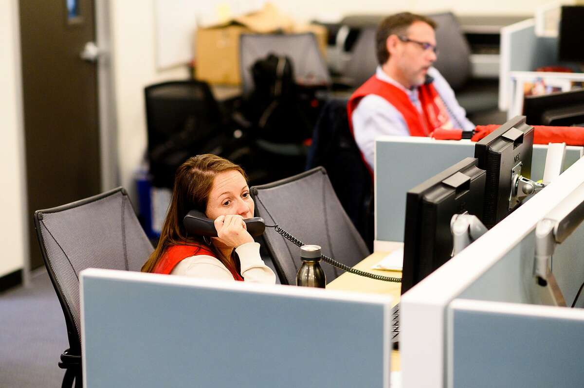 Emergency response manager Elizabeth Bessman works at the San Francisco Department of Emergency Management's Emergency Operations Center on Monday, Jan. 27, 2020, in San Francisco. Officials activated the center to monitor and respond to coronavirus threats.