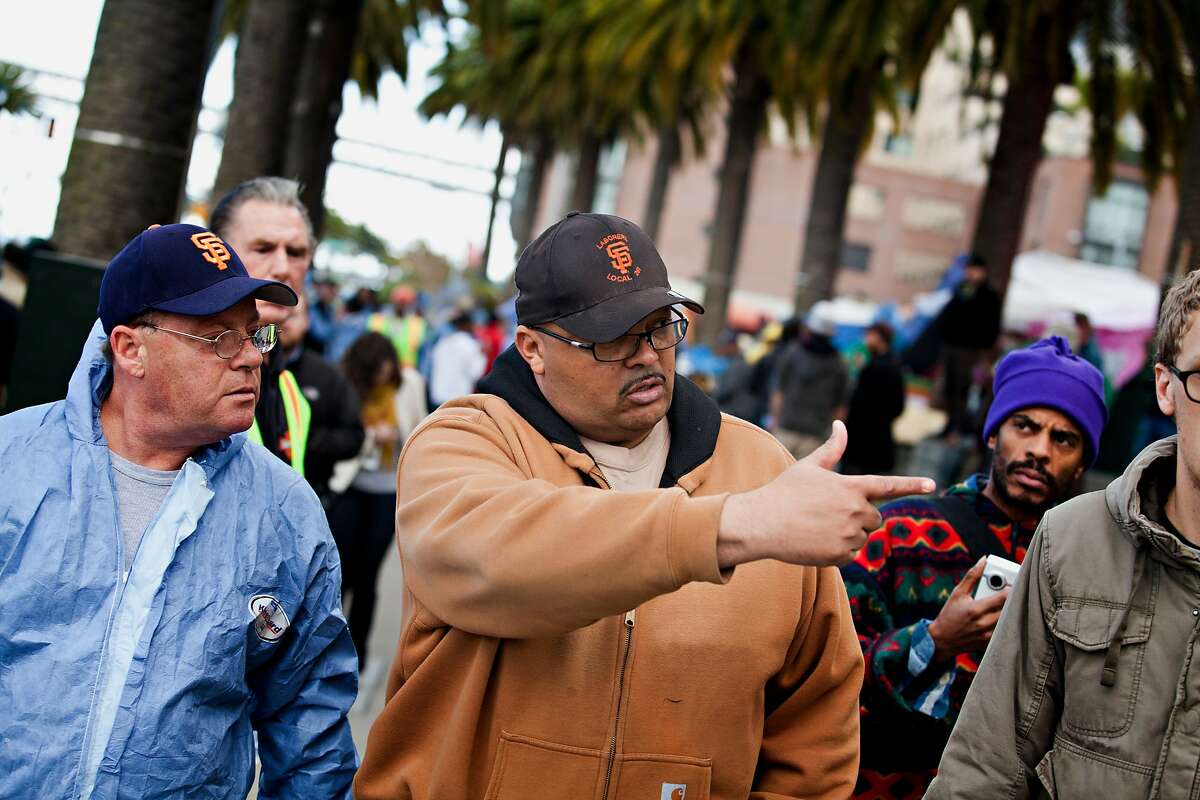 SF Department of Public Works Interim Director Mohammed Nuru supervises as they attempt to clean up Justin Herman Plaza to be compliant with city ordinances Saturday, November 19, 2011. Jason Henry/Special to The Chronicle