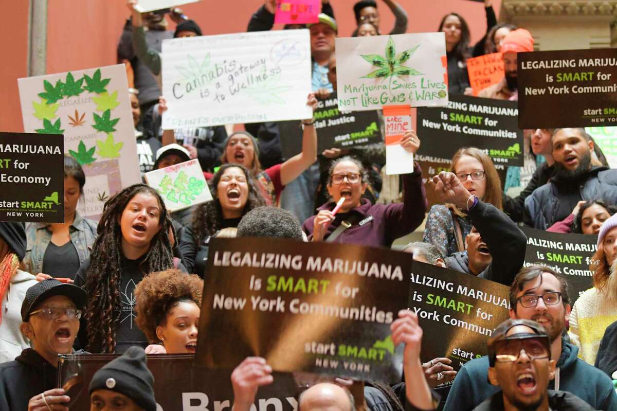 The Start Smart NY Coalition held a rally inside the state Capitol in 2020 calling for tax revenue from eventual marijuana sales to be invested back into communities of color. Now, municipalities choosing whether to opt out of cannabis dispensaries and lounges by Dec. 31, 2021 are weighing whether to forfeit their share of these taxes. (Paul Buckowski/Times Union)