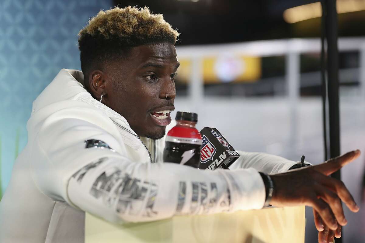 Kansas City Chiefs wide receiver Tyreek Hill speaks to the media during Opening Night for the NFL Super Bowl 54 football game, Monday, Jan. 27, 2020, in Miami. (AP Photo/Steve Luciano)