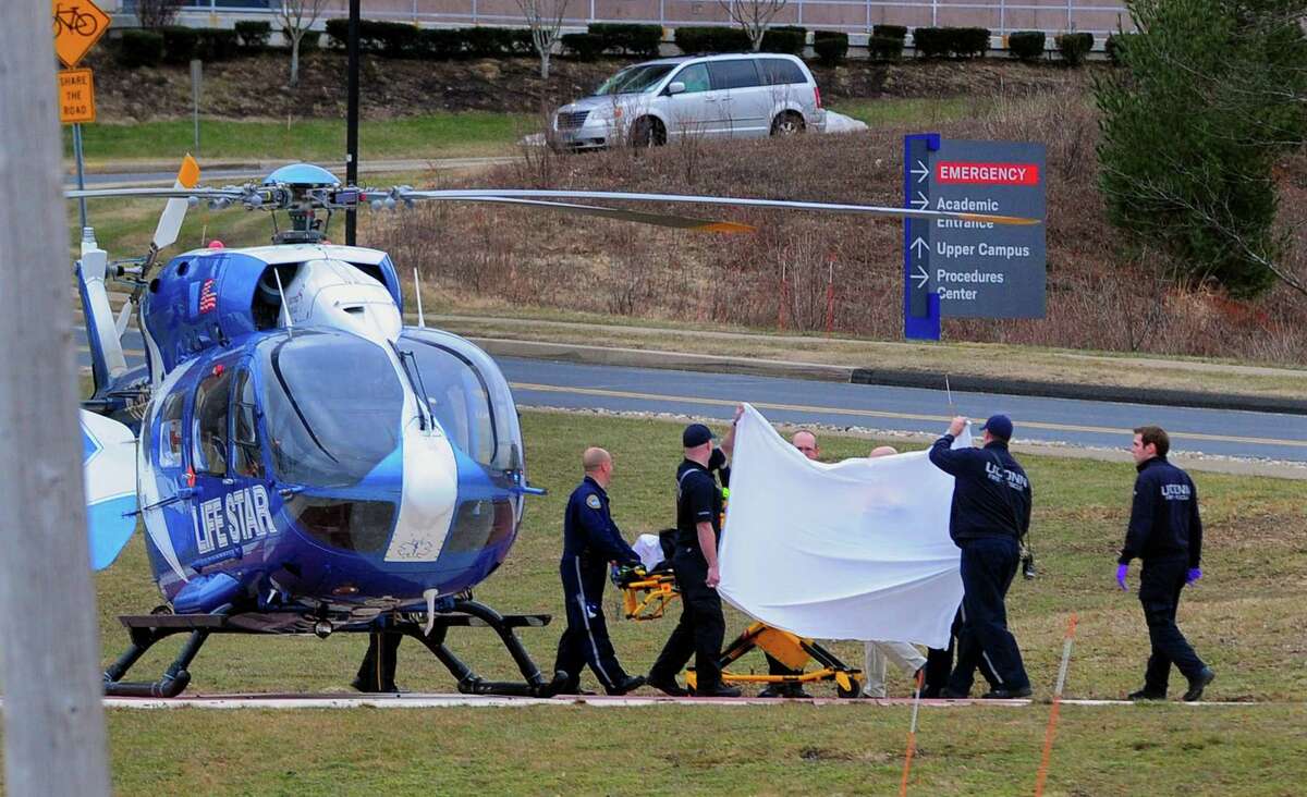 A Life Star helicopter crew prepares to transport Fotis Dulos to Bridgeport Hospital from UConn Heath in Farmington, Conn., on Tuesday Jan. 28, 2020.