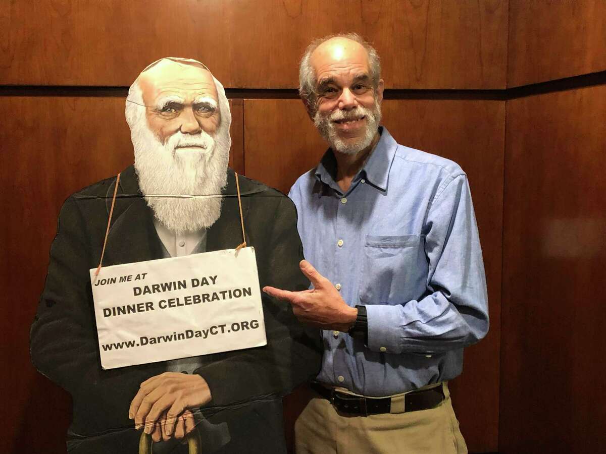 Cary Shaw shows off Charles Darwin in anticipation of the annual Darwin Day dinner in Stamford on Feb. 8.