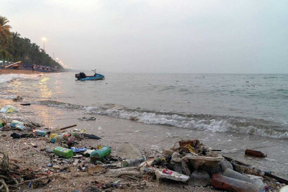 Trash sits along the shore at Bangsaen beach in Chon Buri, Thailand, on Sunday, Jan. 19, 2020. Thailand's love of plastic bags helped make it the sixth-worst maritime polluter. The country generates more than 5,000 metric tons of plastic trash a day, three-quarters of which ends up in landfills.