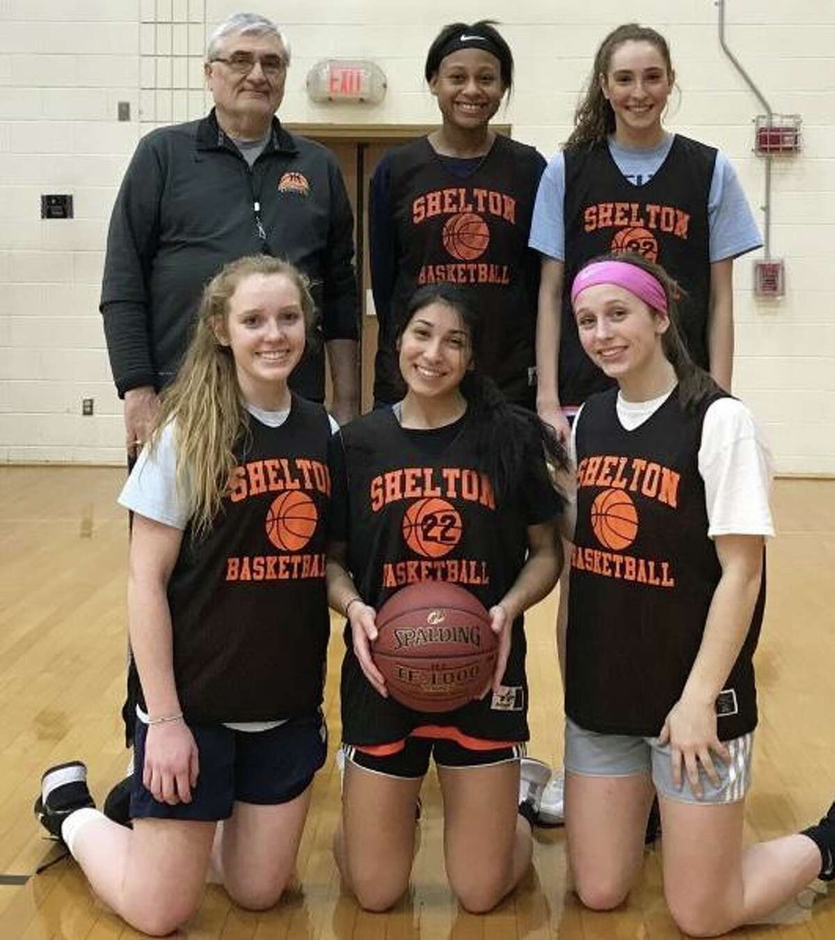 Shelton has opened its season with a 12-1 record. Pictured (front row) are Keira O'Connor, Leya Vohra and Devan Wildman; (second row) coach Joe Cavallaro, Clarissa Pierre and Reem Abdel-Hack.