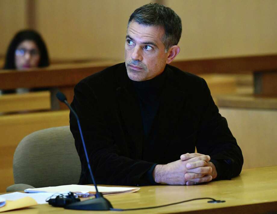 FILE - In this Oct. 4, 2019 file photo, Fotis Dulos, charged with two counts of tampering with evidence and hindering prosecution in the disappearance of his wife, appears with his attorney Kevin Smith at Stamford Superior Court for a pre-trial hearing in Stamford, Conn. Multiple news outlets reported Tuesday, Jan. 28, 2020 that Fotis Dulos was found dead, citing unnamed sources. (Erik Trautmann/Hearst Connecticut Media via AP, Pool) Photo: Erik Trautmann / Associated Press / Norwalk Hour