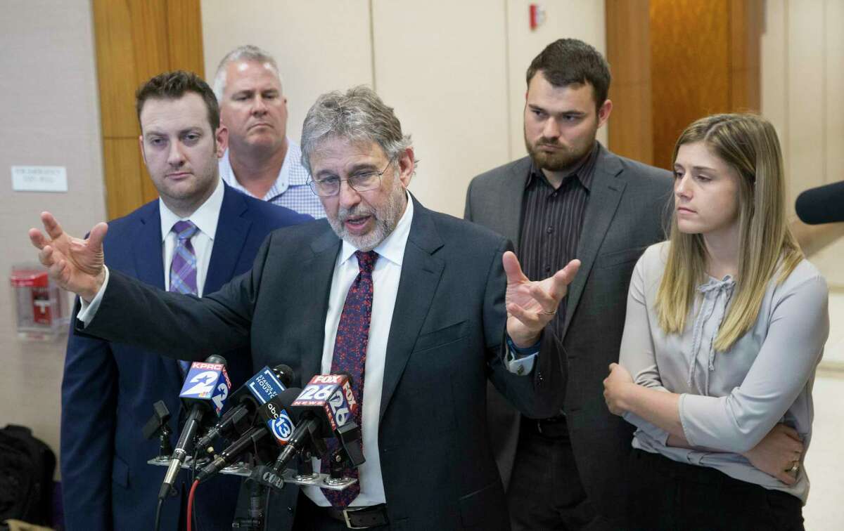 Defense attorneys Romy Kaplan, front two from left, and Stanley Schneider, accompanied by the Temple family, says the family is disappointed to hear that mistrial is declared in the sentencing phase of David Temple's retrial for murdering his pregnant wife, Belinda Lucas Temple, at Harris County Criminal Courts building on Friday, Aug. 9, 2019, in downtown Houston. Temple was originally convicted of the 1999 crime during a 2007 trial, but the conviction was overturned by an appeals court nearly 10 years later.