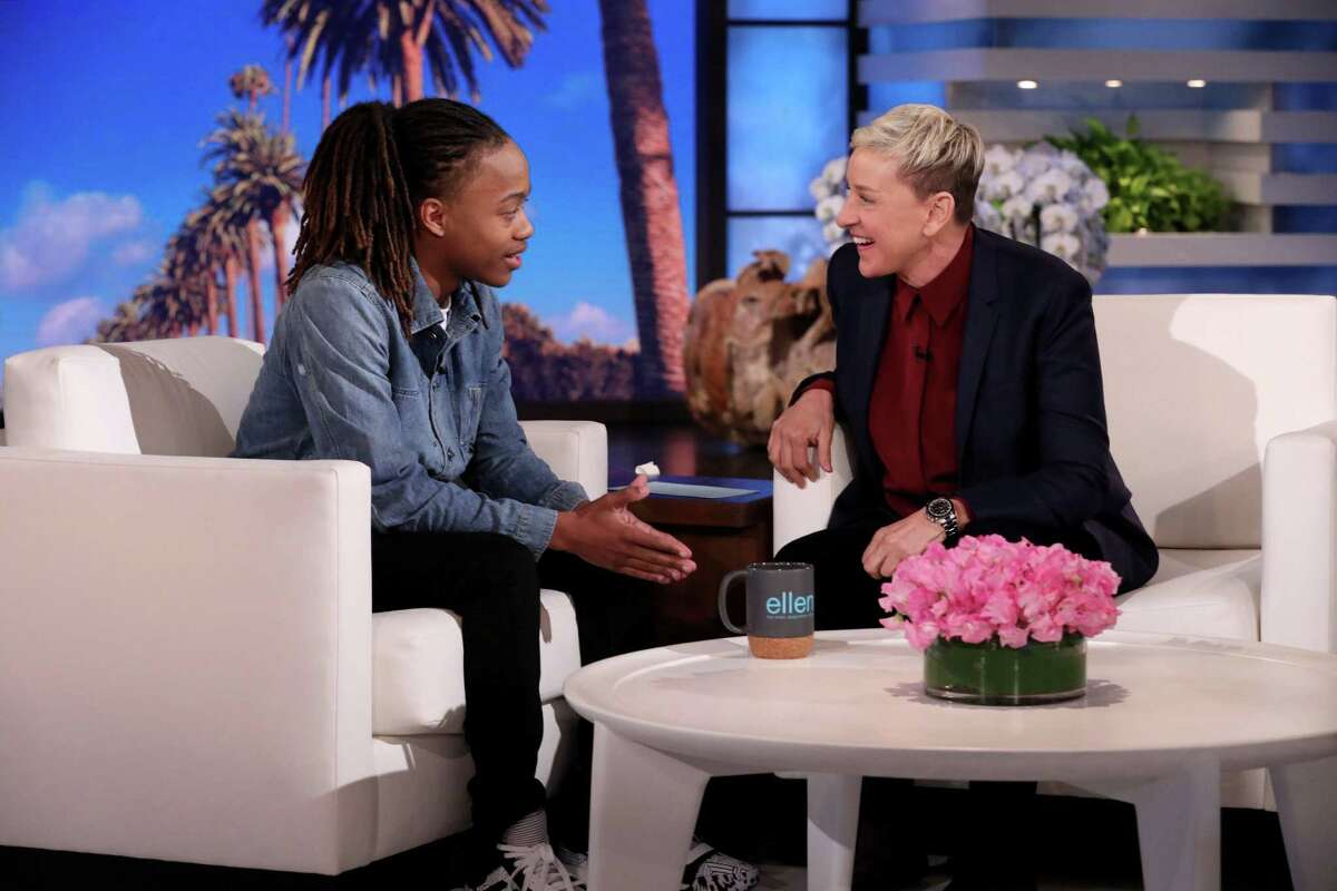 Former Barbers Hill ISD senior DeAndre Arnold meets with Ellen Degeneres on her daytime show. The senior was told that if he did not cut his dreadlocks, he would be suspended and would not be able to walk at his high school graduation.