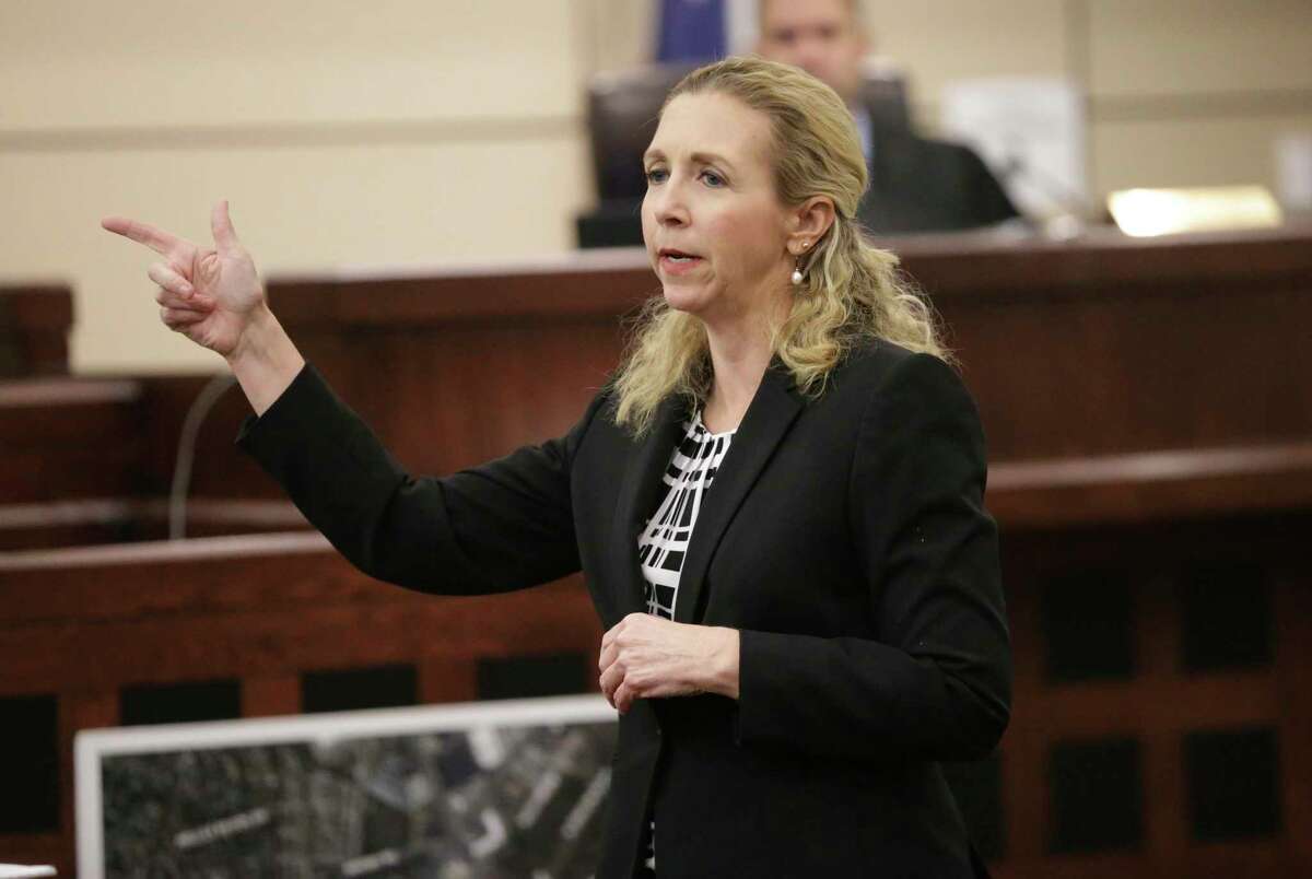 Prosecutor Alaina Altis gestures the use of a handgun during her closing statement Wednesday in the sexual assault trial of Anton Harris.