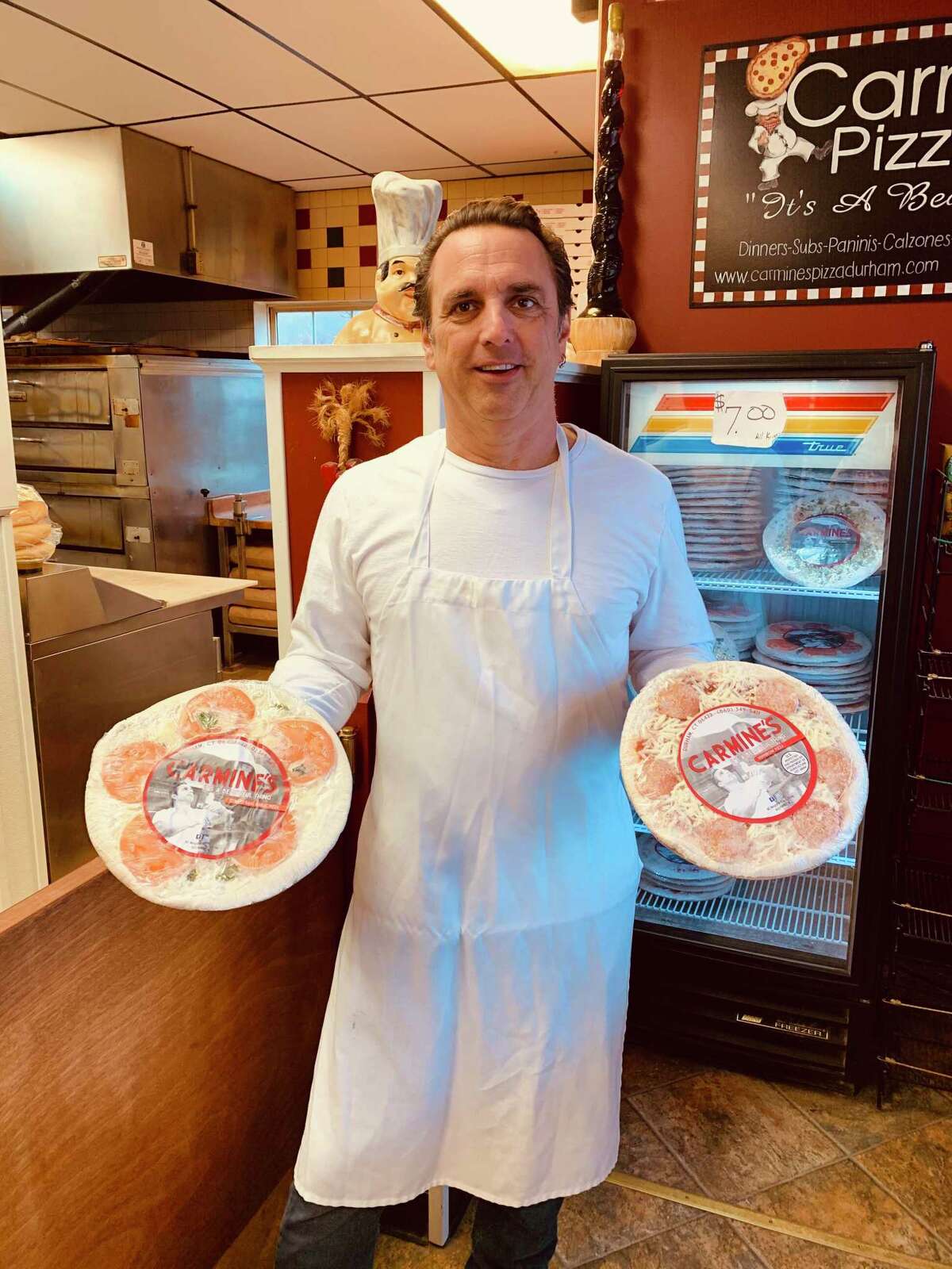 For nearly 18 years, Heath Andranovich, owner of Carmine’s Pizza & Italian Takeout and Carmine’s Frozen Pizzas, has been creating his New Haven-style gourmet pies with locally sourced ingredients using his 100-year-old family recipe.