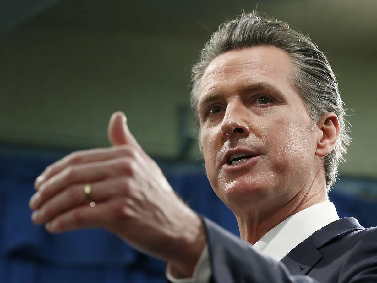 File - In this Jan. 10, 2020, file photo, California Gov. Gavin Newsom responds to reporters question during a news conference in Sacramento, Calif. Pacific Gas & Electric is assuring a federal judge Wednesday, Jan. 29, 2020, it will meet a June 30 deadline for getting out of bankruptcy, as California Gov. Gavin Newsom signaled his intent to follow through on his threat to attempt a government takeover of the nation's largest utility. (AP Photo/Rich Pedroncelli, File)