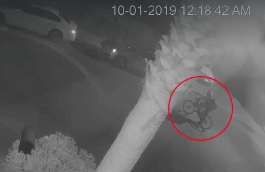 Surveillance video captured this bicyclist stopping by the Santa Cruz home of tech entrepreneur Tushar Atre about three hours before he was kidnapped. The cyclist was apparently casing the residence. Police are asking for the public's help in identifying this person. Photo: Santa Cruz Sheriff's Office