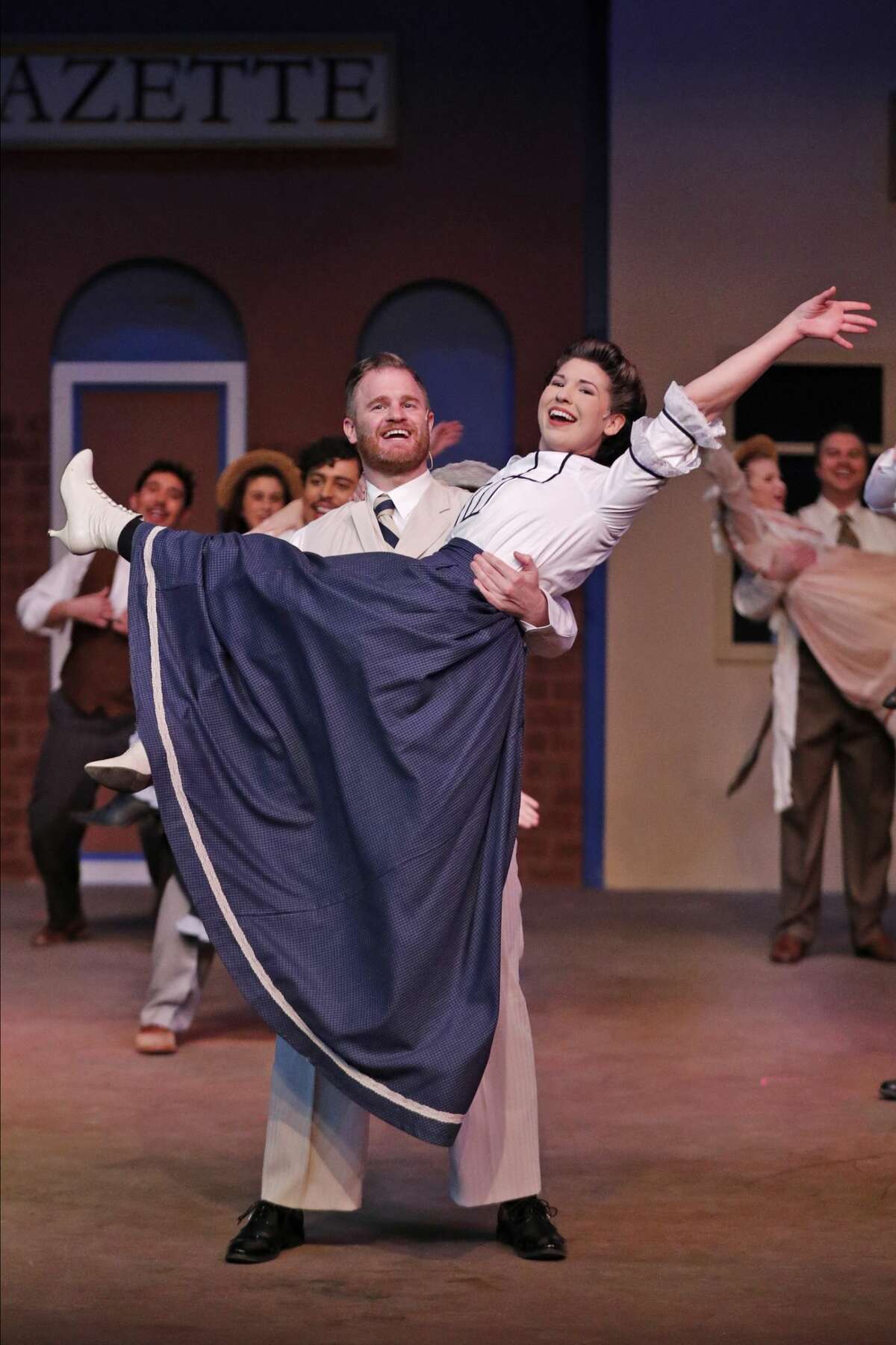 The Music Man, Harold Hill (played by Mark Kaufman), breaks his usual scheme of peddling promises from town to town when he falls in love with Marian the Librarian (played by Renee Pocsik). Promotional photo from dress rehearsal for Midland Community Theatre’s production of “Music Man” photographed January 28, 2020, at MCT.