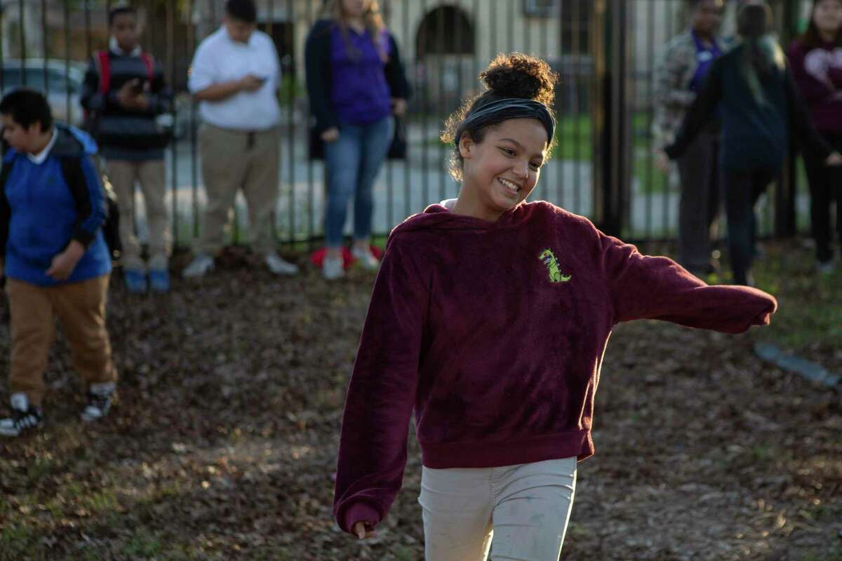 Rihanna Briseño, 12, laughs as she participates in after-school programming at Good Samaritan Community Services on the West Side. She attended a class there last fall that UTSA piloted to teach kids how they can overcome the effects of trauma by regulating emotions, managing stress, developing empathy, building a support system and more.