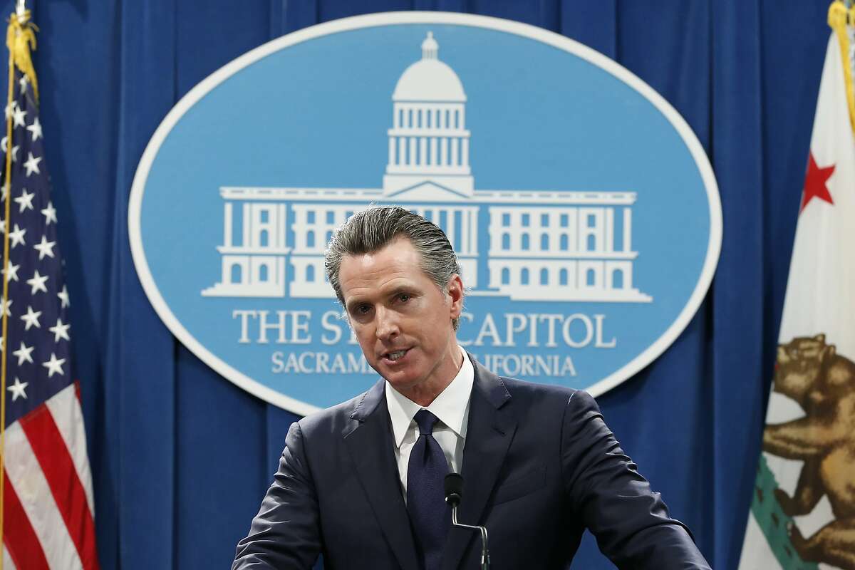 FILE - In this Jan. 10, 2020, file photo, California Gov. Gavin Newsom speaks at a news conference in Sacramento, Calif. Newsom is urging a federal judge to reject Pacific Gas and Electric's blueprint for getting out of bankruptcy and renewing his threat to lead a bid to turn the beleaguered utility into a government-run operation. PG&E is trying to dig out of a financial hole created by more than $50 billion in claims stemming from a series of catastrophic wildfires that have been blamed on the San Francisco company. (AP Photo/Rich Pedroncelli, File)