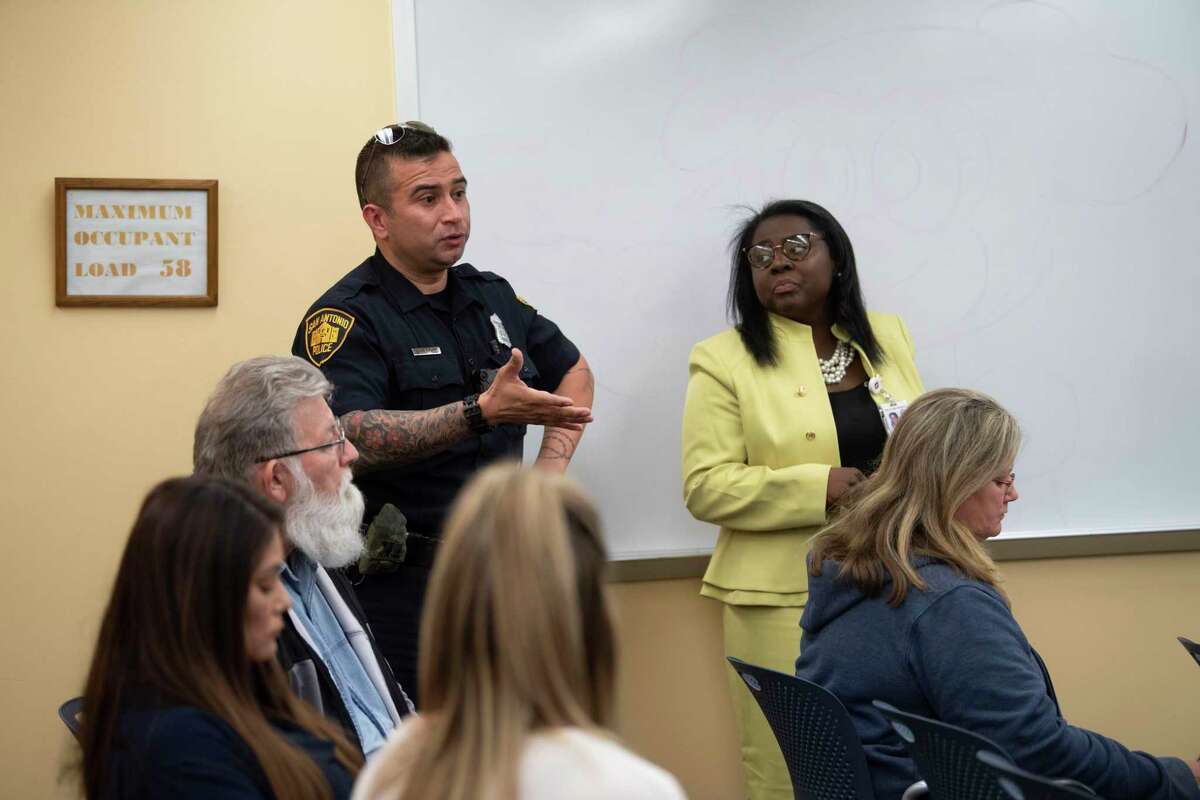 Officer S. Martinez and Morjoriee White of the City of San Antonio comment during a homeless forum at the Great Northwest Library on Wednesday, Jan. 28, 2020. The city, alongside Homebase, a public policy consulting firm hired to develop a homelessness strategic plan, is seeking input from the public on San Antonio's homeless epidemic.