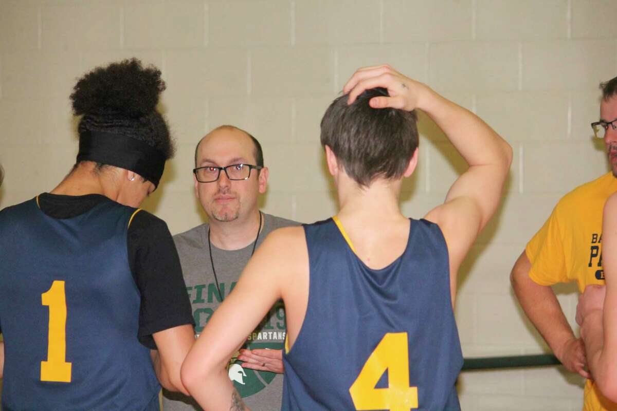 Baldwin coach JJ Eads talks with his players after a Monday practice. (Star photo/John Raffel)