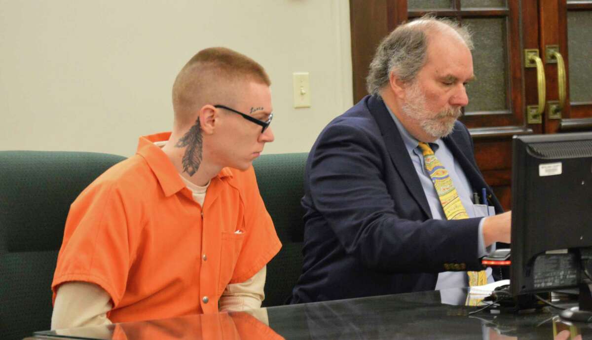 Damian Garrett, left, appears before Judge Stephen Carras of the 42nd Circuit Court with his attorney Dan Duke for a plea hearing Thursday. Garrett faces charges of felony-murder and child abuse in the first degree, stemming from his involvement in the death of 19-month-old Skylar Papple. (Mitchell Kukulka/Mitchell.Kukulka@mdn.net)