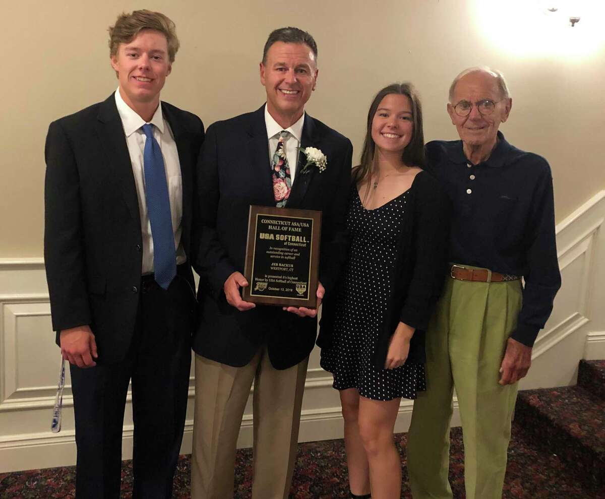 Westport's Jeb Backus with his family during the induction ceremony for the USA Softball Connecticut Hall of Fame.