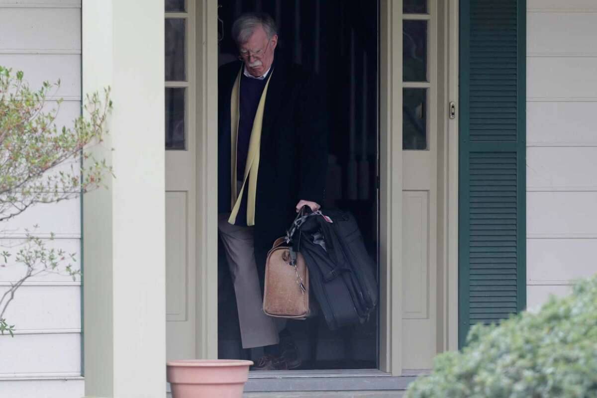 Former National security adviser John Bolton leaves his Maryland home Jan. 28.